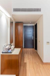 Kuchyň nebo kuchyňský kout v ubytování Ahuja Residency Sage