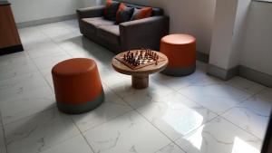 Posezení v ubytování Inventree Hotel,Bangalore