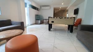Posezení v ubytování Inventree Hotel,Bangalore