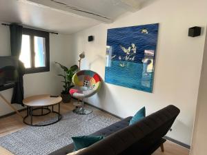 Posedenie v ubytovaní Un balcon, au cœur du village