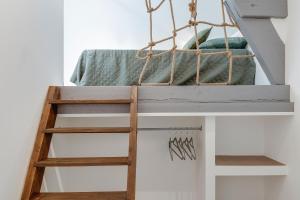 Postel nebo postele na pokoji v ubytování Gite de l'école des Gourmands