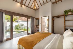 Ένα ή περισσότερα κρεβάτια σε δωμάτιο στο Villa Coco - 2BR Pool Villa +18 φωτογραφίες