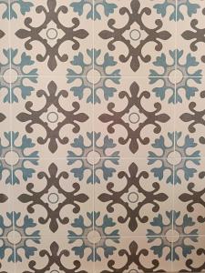 a repeating tile pattern in blue and brown at Casa Marina in Polignano a Mare