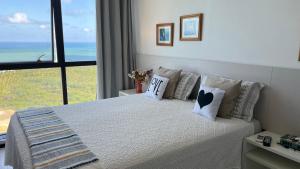 En eller flere senge i et værelse på Barra Home Stay Flat