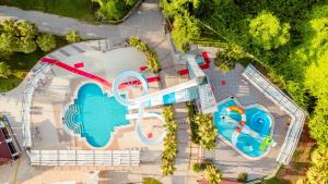 an overhead view of a pool with a water park at Lykia Botanika Beach Fun & Club - All Inclusive in Fethiye