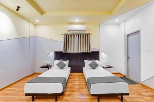 Posezení v ubytování UPAR Hotels Nungambakkam Nearby US Consulate Apollo hospital Sankara Nethralaya