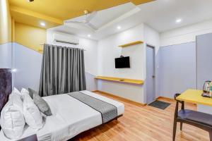 Postel nebo postele na pokoji v ubytování UPAR Hotels Nungambakkam Nearby US Consulate Apollo hospital Sankara Nethralaya
