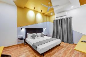 Postel nebo postele na pokoji v ubytování UPAR Hotels Nungambakkam Nearby US Consulate Apollo hospital Sankara Nethralaya
