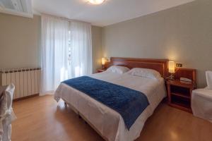 Posteľ alebo postele v izbe v ubytovaní Hotel Due Palme