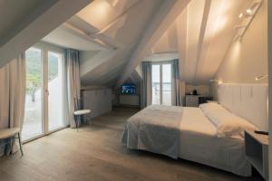 Posteľ alebo postele v izbe v ubytovaní Hotel Due Palme