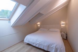 Posteľ alebo postele v izbe v ubytovaní Hotel Due Palme + 37 fotografií