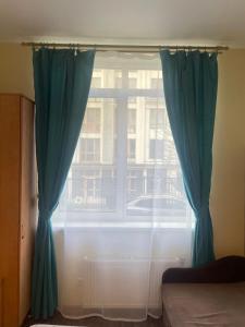 Posteľ alebo postele v izbe v ubytovaní Doba In Ua Studio Irpin Apartments
