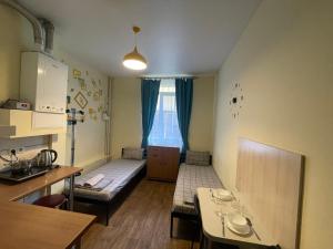 Posteľ alebo postele v izbe v ubytovaní Doba In Ua Studio Irpin Apartments