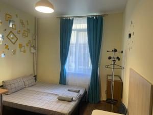 Posteľ alebo postele v izbe v ubytovaní Doba In Ua Studio Irpin Apartments