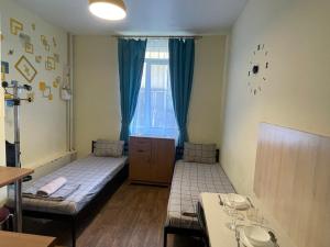 Posteľ alebo postele v izbe v ubytovaní Doba In Ua Studio Irpin Apartments