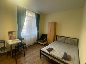 Posteľ alebo postele v izbe v ubytovaní Doba In Ua Studio Irpin Apartments