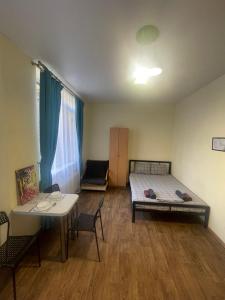 Posteľ alebo postele v izbe v ubytovaní Doba In Ua Studio Irpin Apartments