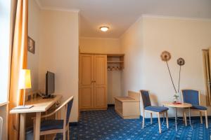 TV a/nebo společenská místnost v ubytování Bischofshof Braustuben