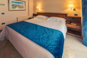 Postel nebo postele na pokoji v ubytování Hotel Bettina