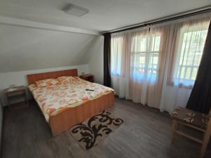 Ένα ή περισσότερα κρεβάτια σε δωμάτιο στο Family&Friends