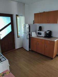 Η κουζίνα ή μικρή κουζίνα στο Family&Friends