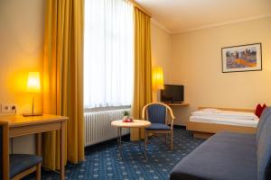 Postel nebo postele na pokoji v ubytování Bischofshof Braustuben