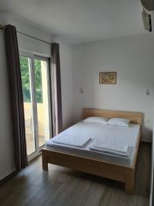Postel nebo postele na pokoji v ubytování Vila Armenko