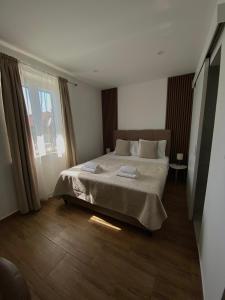 Posteľ alebo postele v izbe v ubytovaní Apartments Adaleta