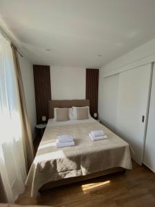 Posteľ alebo postele v izbe v ubytovaní Apartments Adaleta