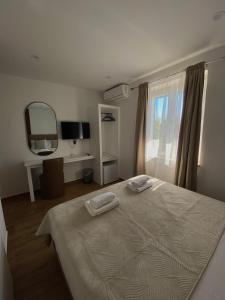 Posteľ alebo postele v izbe v ubytovaní Apartments Adaleta