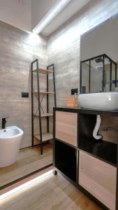 Kúpeľňa v ubytovaní KRLY Rooms Cagliari