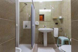 Koupelna v ubytování Hotel La Quercia