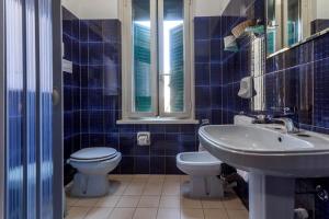 Koupelna v ubytování Hotel La Quercia