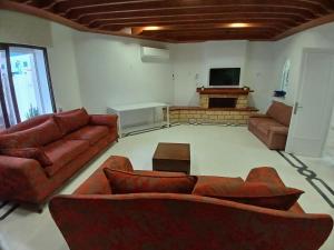 TV a/nebo společenská místnost v ubytování Special inn Lac 1