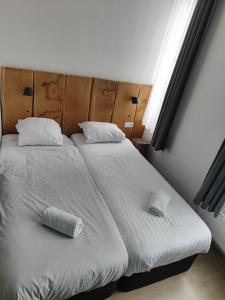 Letto o letti in una camera di Midi 81 HOSTEL