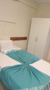 Ένα ή περισσότερα κρεβάτια σε δωμάτιο στο Richards Bay Airport Guest House The Comfort Zone +4 φωτογραφίες