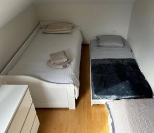 Postel nebo postele na pokoji v ubytování Studio well equipped in Kirchberg for families