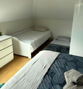 Postel nebo postele na pokoji v ubytování Studio well equipped in Kirchberg for families