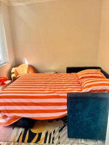 เตียงในห้องที่ Centre ville-vieille ville-promenade des Anglais