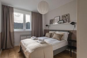 Ένα ή περισσότερα κρεβάτια σε δωμάτιο στο ApartView Suite 34