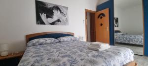 Postel nebo postele na pokoji v ubytování Aqua Apartment + 3 fotografie