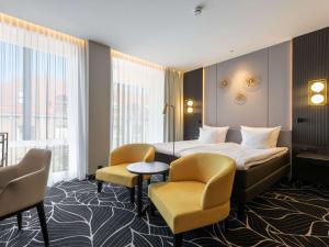 Movenpick Hotel Tallinn客房内的一张或多张床位