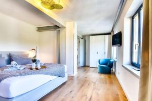 Телевизор и/или развлекательный центр в Ferienwohnung Meerlounge 15 im Haus Düne 7 Prora