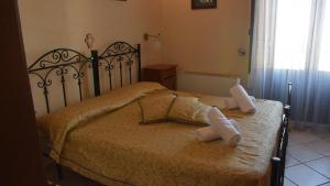Postel nebo postele na pokoji v ubytování OneWay B & B