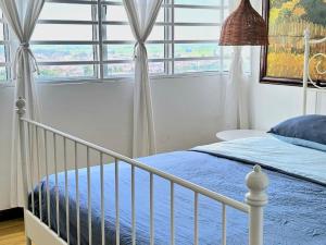 Voodi või voodid majutusasutuse Seaview and 5mins to Paddy Field and Beach toas