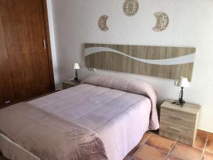 Ένα ή περισσότερα κρεβάτια σε δωμάτιο στο Apartamento en Bahia de Plata Zahara