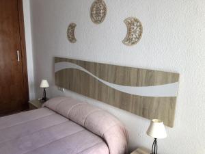 Ένα ή περισσότερα κρεβάτια σε δωμάτιο στο Apartamento en Bahia de Plata Zahara +13 φωτογραφίες