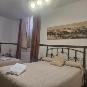 Posteľ alebo postele v izbe v ubytovaní Pensión Javier + 37 fotografií
