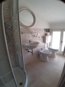 Koupelna v ubytování Hotel Ideal