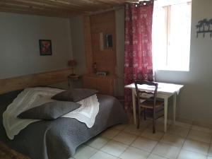 Postel nebo postele na pokoji v ubytování Che'Val d'Amour